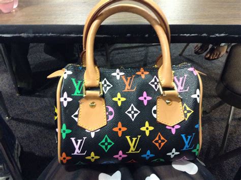 louis vuitton purse rainbow logo with front pocket|Louis Vuitton monogram canvas bag.